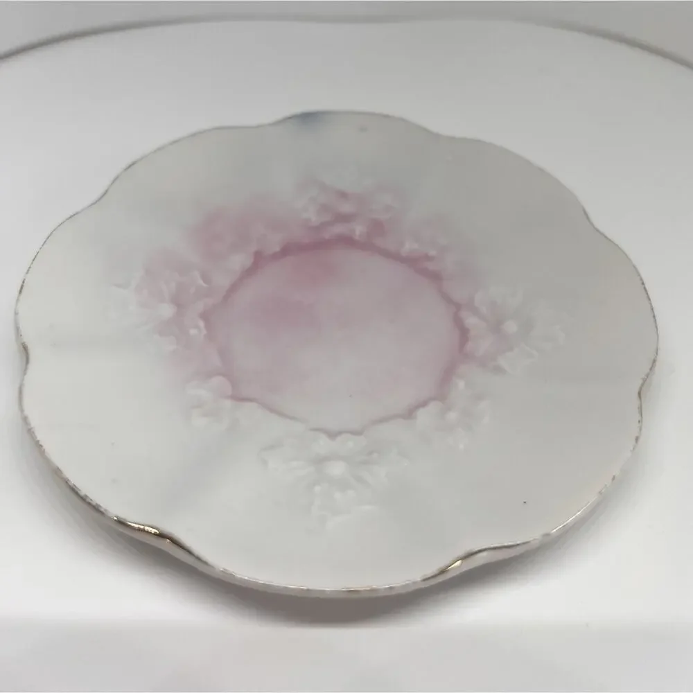 Antique Footed Teacup And Saucer